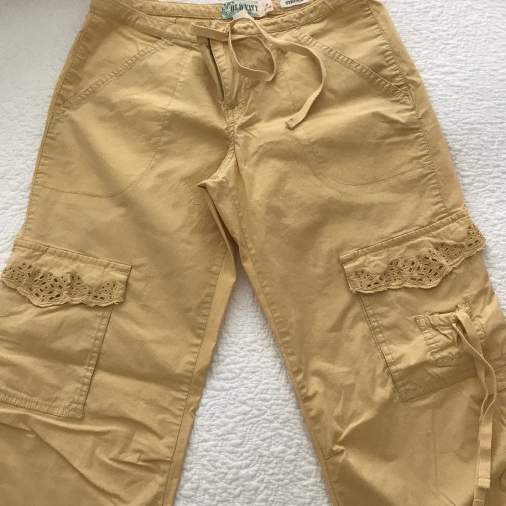 Bootcut gold cotton pants with detailing
